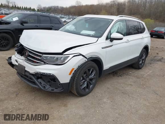 2023 Volkswagen Tiguan SE with VIN 3VVNB7AX4PM100180, listed as a IAAI auction lot 42062208 with 12,922 mi miles and . Bid and sale history available at DreamBid. Image 17.