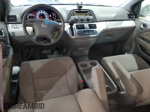 2009 Honda Odyssey EX with VIN 5FNRL38499B002772, listed as a Copart auction lot 59592625 with 100,524 mi miles and Salvage title. Bid and sale history available at DreamBid. Image 8.