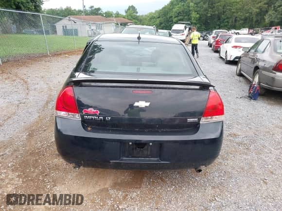 2012 Chevrolet Impala LT Retail with VIN 2G1WB5E35C1128949, listed as a IAAI auction lot 42917488 with 134,926 mi miles and . Bid and sale history available at DreamBid. Image 17.
