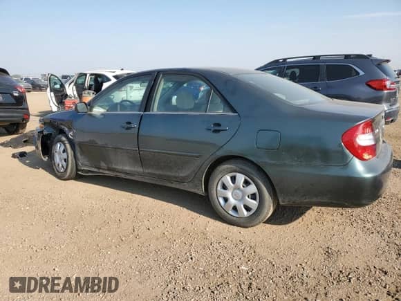 2003 Toyota Camry LE z VIN JTDBE32K030139057, wystawiony jako Copart lot #71503125 z przebiegiem 74 753 mil mil oraz Szkoda całkowita • Salvage title. Historia ofert i sprzedaży dostępna na DreamBid. Obrazek 2.