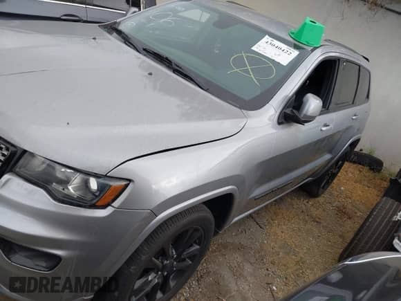2017 Jeep Grand Cherokee Laredo with VIN 1C4RJEAG5HC708008, listed as a IAAI auction lot 43040422 with 125,949 mi miles and . Bid and sale history available at DreamBid. Image 2.