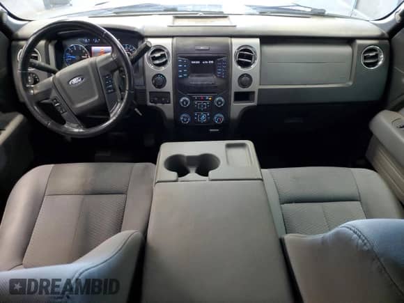 2013 Ford F-150 XLT с VIN 1FTFW1EF0DFB12392, выставлен на аукционе Copart как лот 82501835 с пробегом 183 660 миль миль и Списание • Salvage title. История ставок и продаж доступна на DreamBid. Изображение 8.