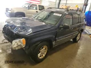 2003 Jeep Grand Cherokee Laredo with VIN 1J4GW48S63C592950, listed as a Copart auction lot 84916165 with 175,069 mi miles and Clean title. Bid and sale history available at DreamBid. Image 1.