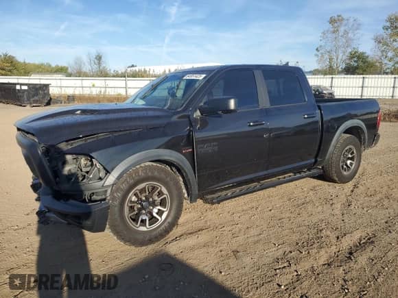 2017 Ram 1500 Rebel z VIN 1C6RR7YT5HS594015, wystawiony jako Copart lot #84951425 z przebiegiem 101 238 mil mil oraz Szkoda całkowita • Salvage title. Historia ofert i sprzedaży dostępna na DreamBid. Obrazek 1.