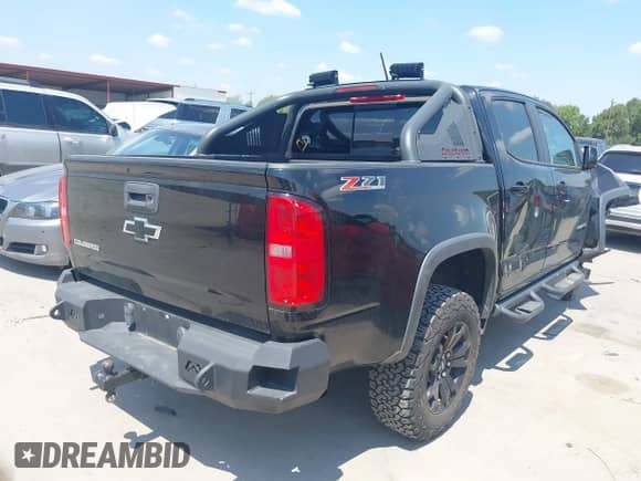 2016 Chevrolet Colorado 4WD Z71 with VIN 1GCGTDE30G1232991, listed as a IAAI auction lot 43040767 with 84,574 mi miles and . Bid and sale history available at DreamBid. Image 4.
