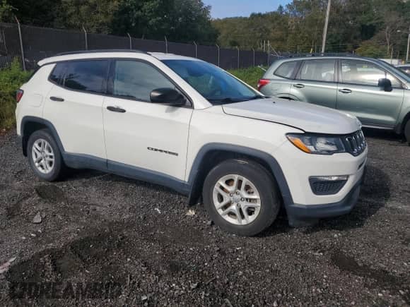 2017 Jeep Compass Sport z VIN 3C4NJCAB0HT668299, wystawiony jako Copart lot #86617385 z przebiegiem 89 906 mil mil oraz Czysty tytuł • Clean title. Historia ofert i sprzedaży dostępna na DreamBid. Obrazek 4.
