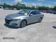 2018 Honda Accord EX-L with VIN 1HGCV3F58JA014356, listed as a IAAI auction lot 42890271 with 47,174 mi miles and . Bid and sale history available at DreamBid. Image 2.