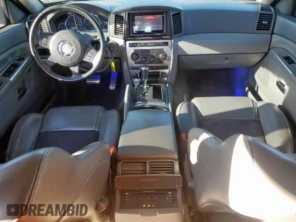 2007 Jeep Grand Cherokee SRT-8 с VIN 1J8HR78397C622839, выставлен на аукционе Copart как лот 50152185 с пробегом 182 655 миль миль и Списание • Salvage title. История ставок и продаж доступна на DreamBid. Изображение 8.