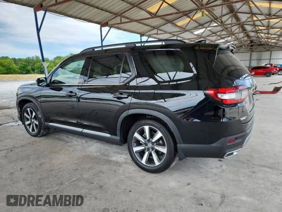 2024 Honda Pilot Touring с VIN 5FNYG2H74RB012467, выставлен на аукционе Copart как лот 58203785 с пробегом 80 924 миль миль и Списание • Salvage title. История ставок и продаж доступна на DreamBid. Изображение 2.