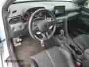 2021 Hyundai Veloster z VIN KMHT36AH1MU008985, wystawiony jako Copart lot #80621594 z przebiegiem 16 722 mil mil oraz Szkoda całkowita • Salvage title. Historia ofert i sprzedaży dostępna na DreamBid. Obrazek 8.