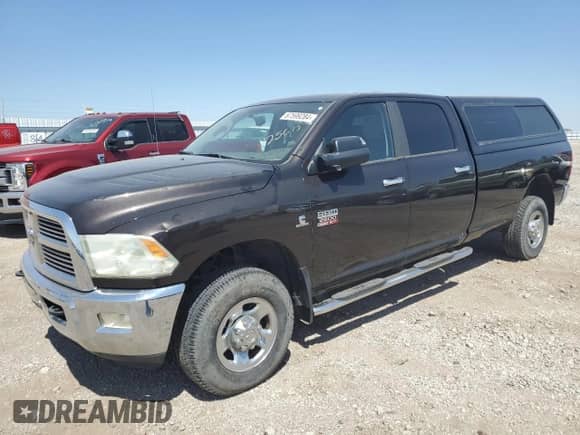 2010 Dodge 2500 ST with VIN 3D7UT2CL2AG125675, listed as a Copart auction lot 67599284 with 136,038 mi miles and Salvage title. Bid and sale history available at DreamBid. Image 1.