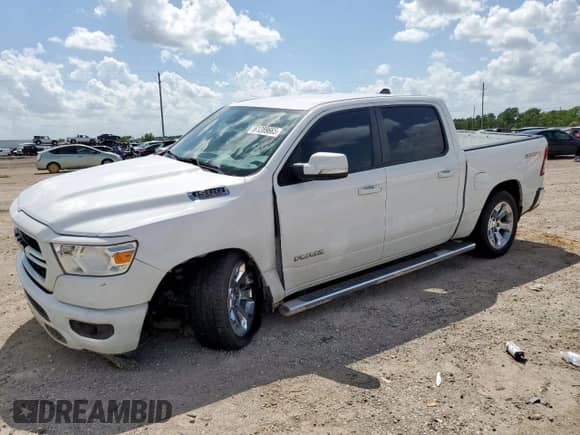 2020 Ram 1500 Lone Star with VIN 1C6RREFM0LN245982, listed as a Copart auction lot 61289665 with 97,036 mi miles and Salvage title. Bid and sale history available at DreamBid. Image 1.