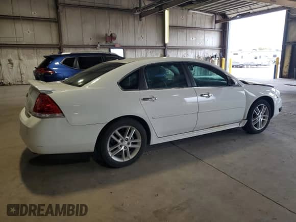 2012 Chevrolet Impala LTZ with VIN 2G1WC5E30C1221083, listed as a Copart auction lot 81643965 with 153,674 mi miles and Salvage title. Bid and sale history available at DreamBid. Image 3.