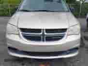 2014 Dodge Grand Caravan American Value with VIN 2C4RDGBG0ER130064, listed as a IAAI auction lot 43419562 with 161,517 mi miles and . Bid and sale history available at DreamBid. Image 6.