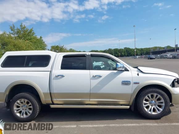 2014 Ram 1500 Longhorn z VIN 1C6RR7PT7ES368846, wystawiony jako IAAI lot #43137351 z przebiegiem 142 136 mil mil oraz . Historia ofert i sprzedaży dostępna na DreamBid. Obrazek 13.