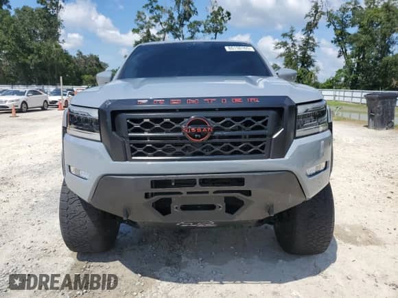 2023 Nissan Frontier SV z VIN 1N6ED1EJ1PN618570, wystawiony jako Copart lot #80138165 z przebiegiem 29 890 mil mil oraz Szkoda całkowita • Salvage title. Historia ofert i sprzedaży dostępna na DreamBid. Obrazek 5.