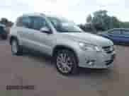 2011 Volkswagen Tiguan S with VIN WVGBV7AXXBW560022, listed as a IAAI auction lot 42693212 with 127,879 mi miles and . Bid and sale history available at DreamBid. Image 1.