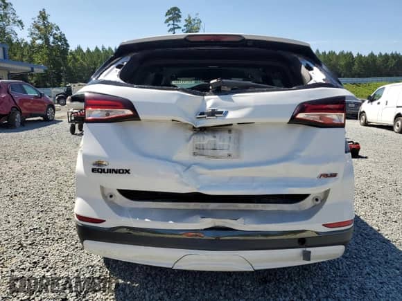 2022 Chevrolet Equinox RS с VIN 3GNAXMEV4NS223645, выставлен на аукционе Copart как лот 69794145 с пробегом 52 338 миль миль и Списание • Salvage title. История ставок и продаж доступна на DreamBid. Изображение 6.