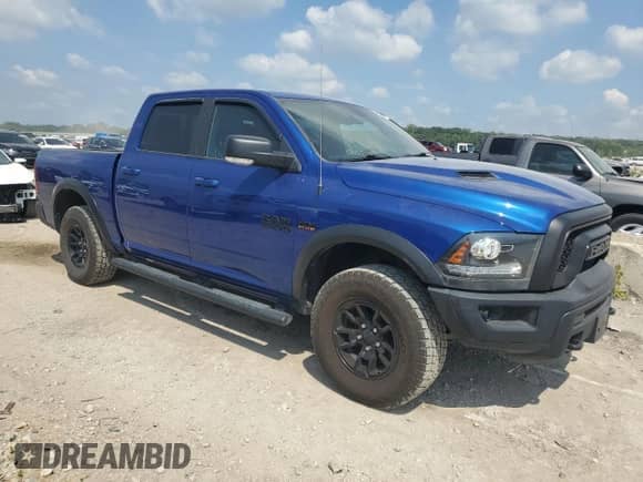 2017 Ram 1500 Rebel z VIN 1C6RR7YT0HS788855, wystawiony jako Copart lot #68827425 z przebiegiem 134 710 mil mil oraz Szkoda całkowita • Salvage title. Historia ofert i sprzedaży dostępna na DreamBid. Obrazek 4.