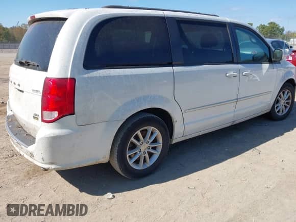 2014 Dodge Grand Caravan SXT with VIN 2C4RDGCG4ER356980, listed as a IAAI auction lot 43422340 with 220,103 mi miles and . Bid and sale history available at DreamBid. Image 4.