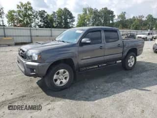 2014 Toyota Tacoma PreRunner z VIN 5TFJU4GN0EX062661, wystawiony jako Copart lot #69232355 z przebiegiem 203 291 mil mil oraz Szkoda całkowita • Salvage title. Historia ofert i sprzedaży dostępna na DreamBid. Obrazek 1.