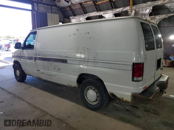2001 Ford Econoline Cargo z VIN 1FTRE14221HA05990, wystawiony jako Copart lot #81243185 z przebiegiem 178 043 mil mil oraz Szkoda całkowita • Salvage title. Historia ofert i sprzedaży dostępna na DreamBid. Obrazek 2.