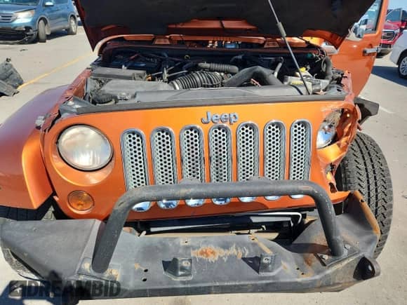 2011 Jeep Wrangler Sahara с VIN 1J4GA5D18BL576541, выставлен на аукционе Copart как лот 87415305 с пробегом 142 246 миль миль и Списание • Salvage title. История ставок и продаж доступна на DreamBid. Изображение 12.