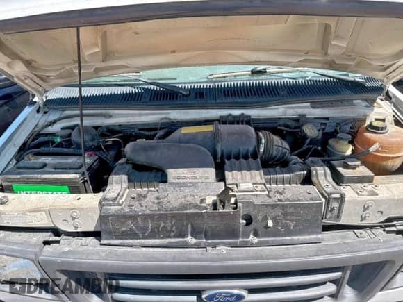 2003 Ford Econoline Cargo с VIN 1FTRE14203HB16427, выставлен на аукционе Copart как лот 70927765 с пробегом 194 552 миль миль и Чистый • Clean title. История ставок и продаж доступна на DreamBid. Изображение 7.