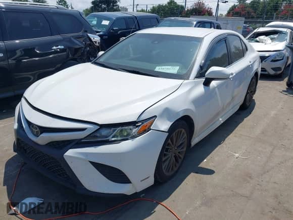 2018 Toyota Camry SE with VIN 4T1B11HK8JU026420, listed as a IAAI auction lot 43038626 with 114,080 mi miles and . Bid and sale history available at DreamBid. Image 2.