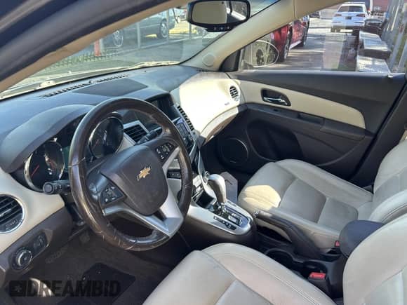 2014 Chevrolet Cruze LTZ with VIN 1G1PG5SB4E7332200, listed as a IAAI auction lot 43201338 with 151,318 mi miles and . Bid and sale history available at DreamBid. Image 5.