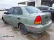 2003 Hyundai Accent GL z VIN KMHCG45C83U477254, wystawiony jako IAAI lot #42621015 z przebiegiem 71 966 mil mil oraz . Historia ofert i sprzedaży dostępna na DreamBid. Obrazek 3.