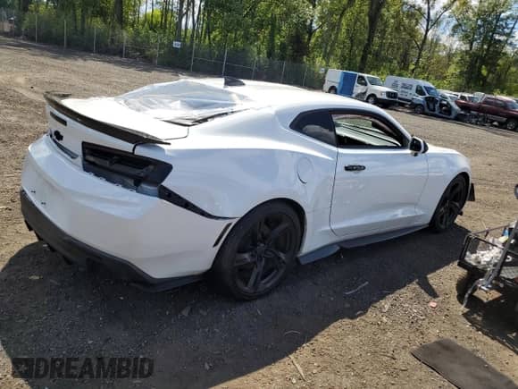 2018 Chevrolet Camaro 1LS с VIN 1G1FA1RSXJ0121582, выставлен на аукционе Copart как лот 70144895 с пробегом Не указан миль и Списание • Salvage title. История ставок и продаж доступна на DreamBid. Изображение 3.