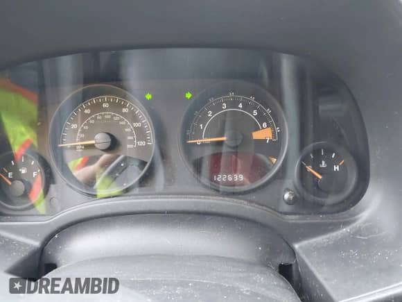 2014 Jeep Compass Sport z VIN 1C4NJDBBXED665156, wystawiony jako IAAI lot #43095675 z przebiegiem 122 639 mil mil oraz . Historia ofert i sprzedaży dostępna na DreamBid. Obrazek 7.