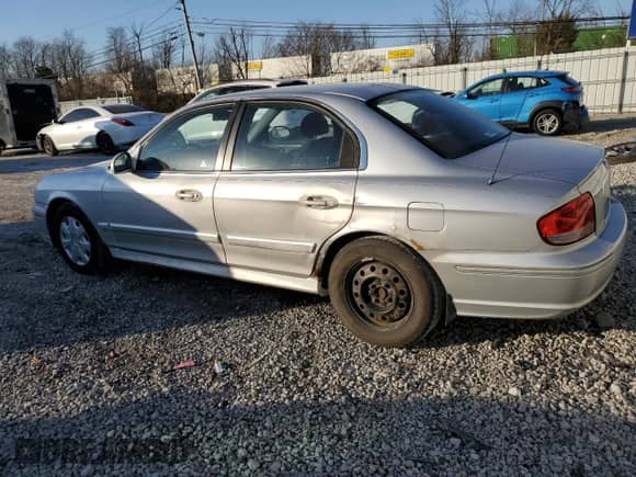 2004 Hyundai Sonata with VIN KMHWF25H14A988842, listed as a Copart auction lot 48551335 with 149,097 mi miles and Salvage title. Bid and sale history available at DreamBid. Image 2.