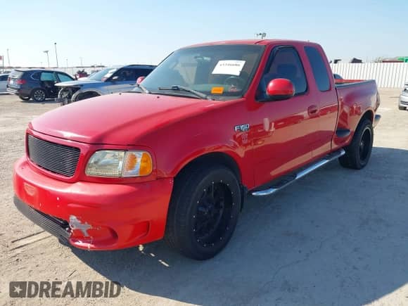 2003 Ford F-150 XL with VIN 1FTRX072X3KD60721, listed as a IAAI auction lot 43346686 with Not provided miles and . Bid and sale history available at DreamBid. Image 2.