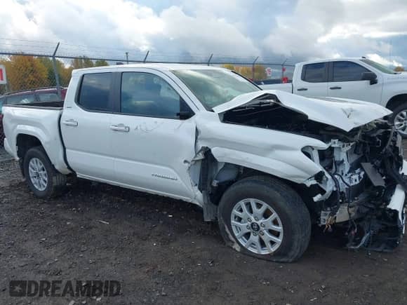 2024 Toyota Tacoma SR5 with VIN 3TMLB5JN5RM010502, listed as a IAAI auction lot 43521054 with 22,894 mi miles and . Bid and sale history available at DreamBid. Image 1.