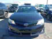 2014 Toyota Camry SE Sport with VIN 4T1BF1FK0EU320324, listed as a IAAI auction lot 43368424 with 122,618 mi miles and . Bid and sale history available at DreamBid. Image 12.