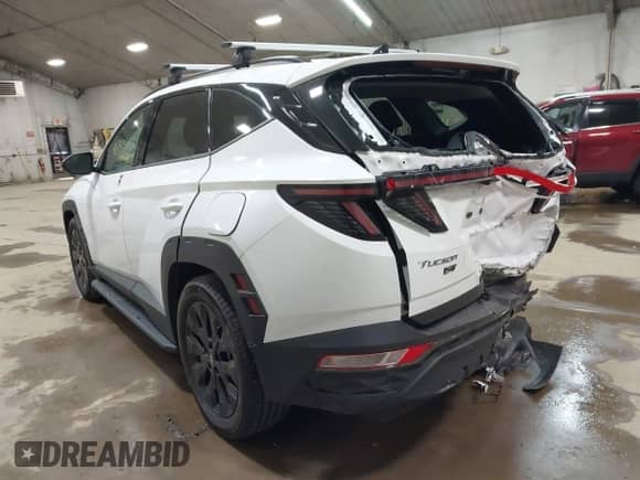 2023 Hyundai Tucson XRT with VIN KM8JF3AE7PU262546, listed as a IAAI auction lot 41887705 with 12,645 mi miles and . Bid and sale history available at DreamBid. Image 3.