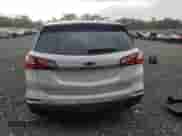 2020 Chevrolet Equinox Premier с VIN 3GNAXYEX9LS665844, выставлен на аукционе Copart как лот 68512015 с пробегом 16 080 миль миль и Списание • Salvage title. История ставок и продаж доступна на DreamBid. Изображение 6.