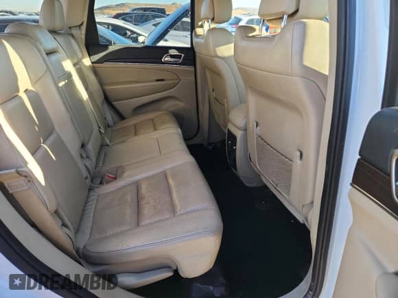 2014 Jeep Grand Cherokee Limited с VIN 1C4RJFBT3EC162600, выставлен на аукционе Copart как лот 81197575 с пробегом 152 703 миль миль и Списание • Salvage title. История ставок и продаж доступна на DreamBid. Изображение 10.