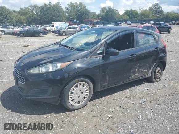 2014 Ford Fiesta S with VIN 3FADP4TJXEM221267, listed as a Copart auction lot 71096955 with 121,703 mi miles and Salvage title. Bid and sale history available at DreamBid. Image 1.