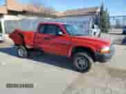 2000 Dodge Dakota Sport with VIN 1B7GG22N1YS780069, listed as a Copart auction lot 52019815 with 164,869 mi miles and Salvage title. Bid and sale history available at DreamBid. Image 4.
