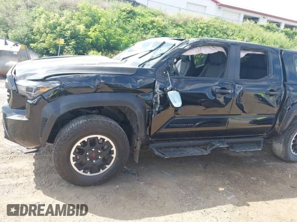 2024 Toyota Tacoma SR5 with VIN 3TMLB5JN4RM054958, listed as a IAAI auction lot 43047601 with 15,429 mi miles and . Bid and sale history available at DreamBid. Image 6.