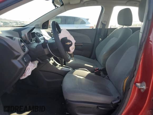 2012 Chevrolet Sonic LS z VIN 1G1JA5SH5C4222752, wystawiony jako Copart lot #69667635 z przebiegiem 86 479 mil mil oraz Szkoda całkowita • Salvage title. Historia ofert i sprzedaży dostępna na DreamBid. Obrazek 7.
