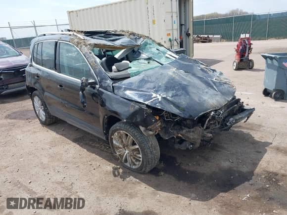 2011 Volkswagen Tiguan S with VIN WVGAV7AX4BW506582, listed as a IAAI auction lot 42080965 with Not provided miles and . Bid and sale history available at DreamBid. Image 1.