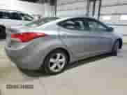 2013 Hyundai Elantra GLS z VIN KMHDH4AE5DU936699, wystawiony jako Copart lot #82490225 z przebiegiem 98 331 mil mil oraz Szkoda całkowita • Salvage title. Historia ofert i sprzedaży dostępna na DreamBid. Obrazek 3.