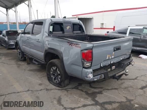2021 Toyota Tacoma SR5 with VIN 3TMAZ5CN8MM140976, listed as a IAAI auction lot 41513243 with 109,786 mi miles and . Bid and sale history available at DreamBid. Image 3.
