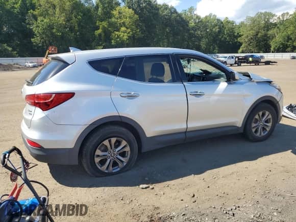 2015 Hyundai Santa Fe z VIN 5XYZTDLB7FG301905, wystawiony jako Copart lot #70538585 z przebiegiem 76 277 mil mil oraz Szkoda całkowita • Salvage title. Historia ofert i sprzedaży dostępna na DreamBid. Obrazek 3.
