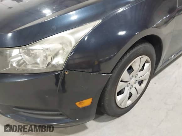 2014 Chevrolet Cruze LS with VIN 1G1PA5SG1E7153822, listed as a IAAI auction lot 43535995 with 166,563 mi miles and . Bid and sale history available at DreamBid. Image 13.