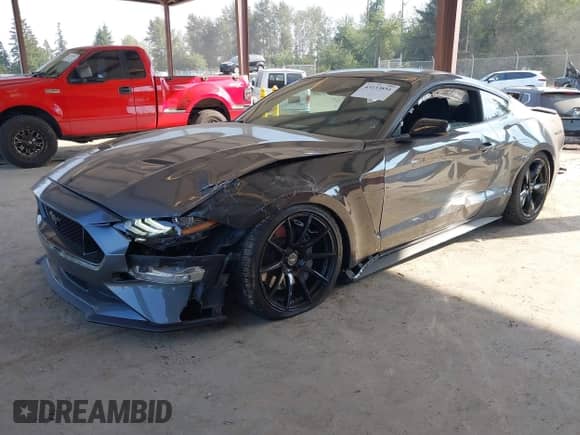 2022 Ford Mustang GT with VIN 1FA6P8CF6N5149498, listed as a IAAI auction lot 43133851 with 26,729 mi miles and . Bid and sale history available at DreamBid. Image 2.